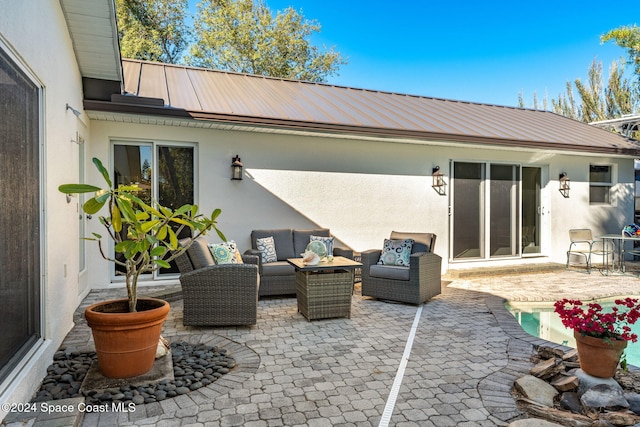 view of patio / terrace with an outdoor hangout area