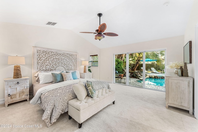 carpeted bedroom with access to exterior, ceiling fan, and lofted ceiling