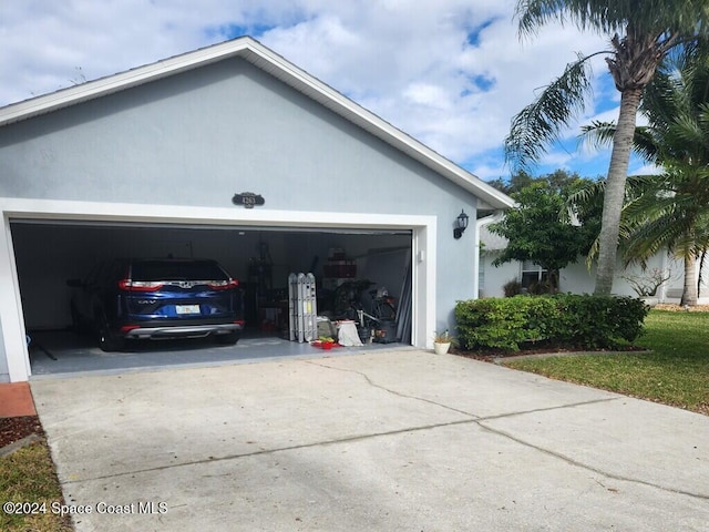 view of property exterior with a garage