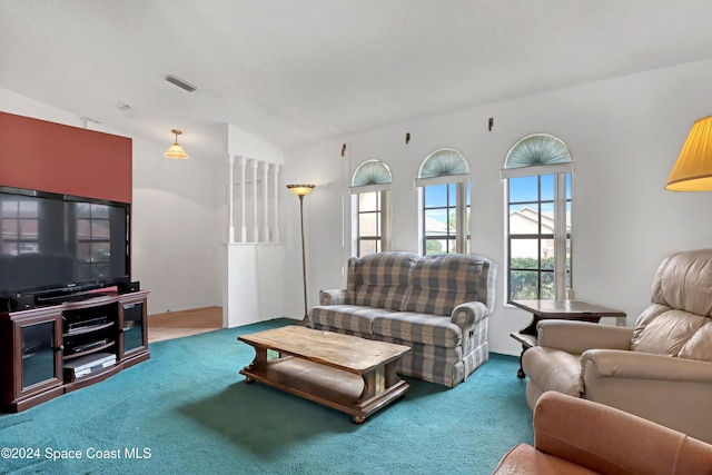 living room with carpet flooring and lofted ceiling