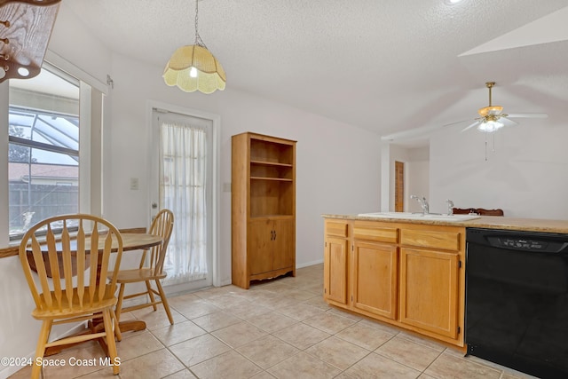 kitchen featuring light tile patterned flooring, pendant lighting, black dishwasher, and sink