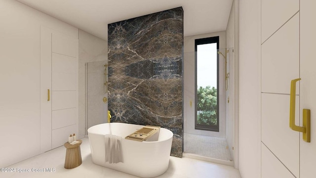 bathroom with a bath and tile walls