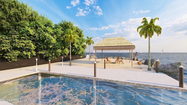 view of swimming pool featuring a gazebo and a water view