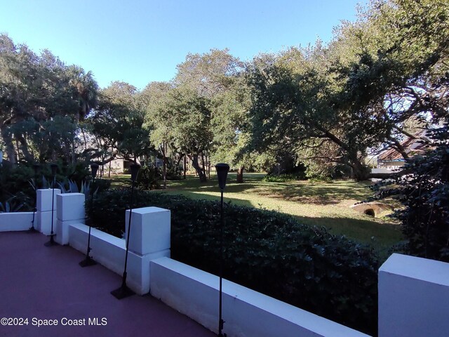 272 Aquarina Blvd Unit 272, Melbourne Beach, FL 32951 - view of patio with a fenced front yard