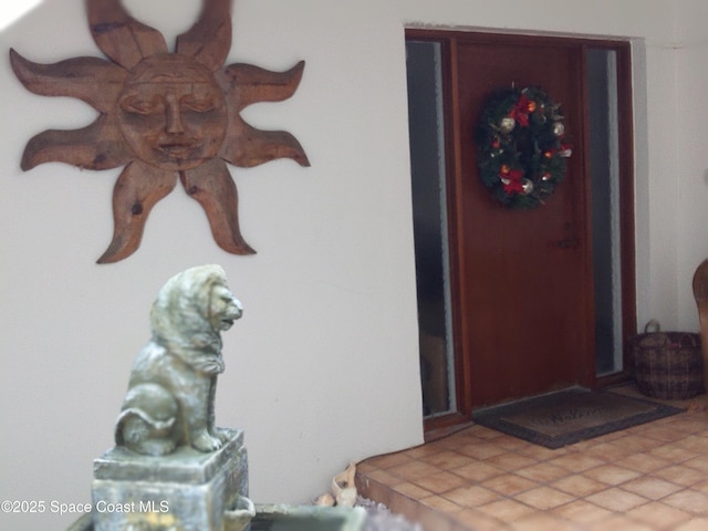 272 Aquarina Blvd Unit 272, Melbourne Beach, FL 32951 - entrance to property featuring stucco siding