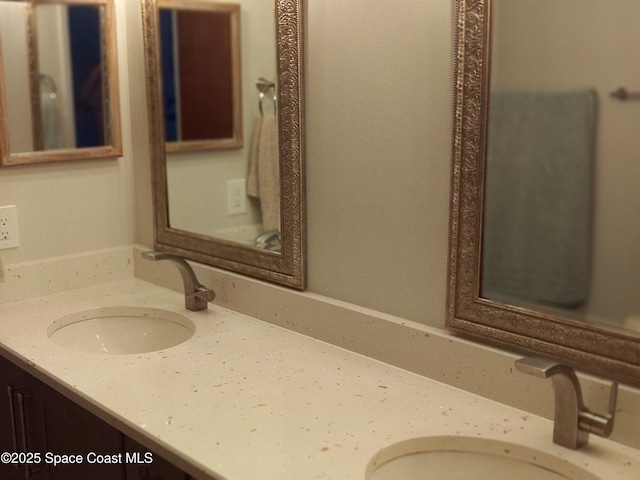 272 Aquarina Blvd Unit 272, Melbourne Beach, FL 32951 - bathroom featuring double vanity