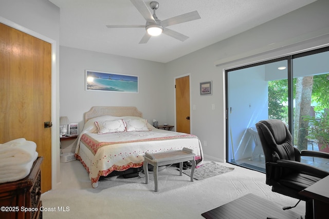 carpeted bedroom featuring ceiling fan and access to exterior