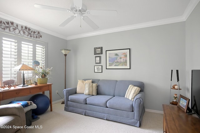 living room featuring carpet flooring, ceiling fan, and ornamental molding