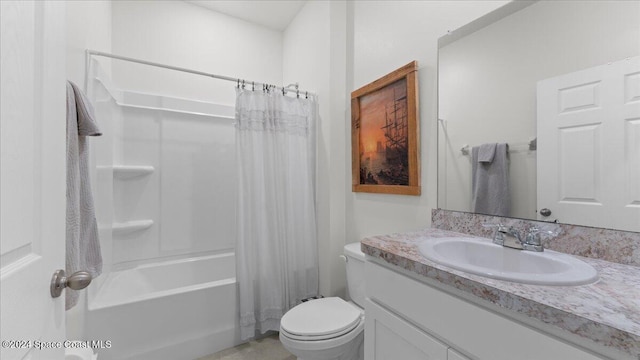 full bathroom featuring shower / bath combo, vanity, and toilet