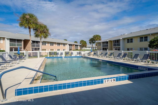 997 Sonesta Ave NE Unit 206, Palm Bay, FL 32905 - community pool with a patio