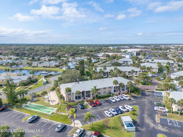 997 Sonesta Ave NE Unit 206, Palm Bay, FL 32905 - aerial perspective of suburban area with a large body of water