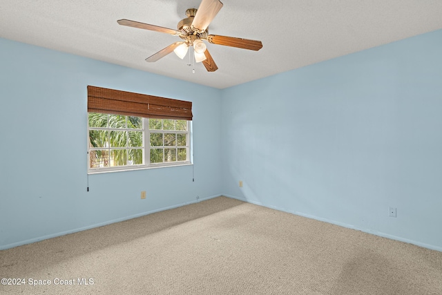997 Sonesta Ave NE Unit 206, Palm Bay, FL 32905 - unfurnished room with carpet and a ceiling fan