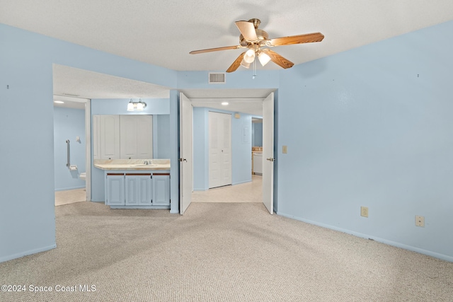 997 Sonesta Ave NE Unit 206, Palm Bay, FL 32905 - unfurnished bedroom with light colored carpet and baseboards