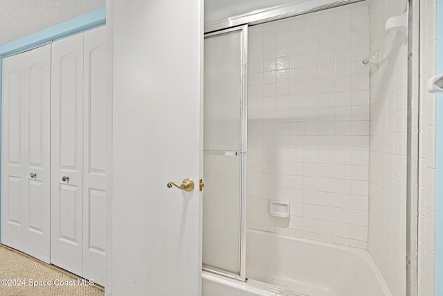 997 Sonesta Ave NE Unit 206, Palm Bay, FL 32905 - full bath featuring combined bath / shower with glass door and a closet