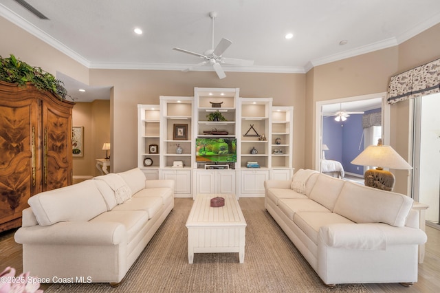 living room featuring light hardwood / wood-style flooring, ceiling fan, and ornamental molding