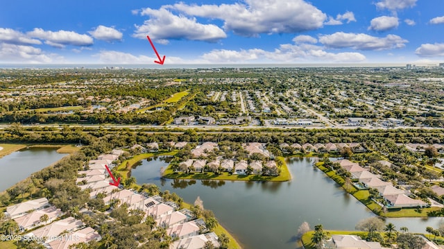 bird's eye view with a water view