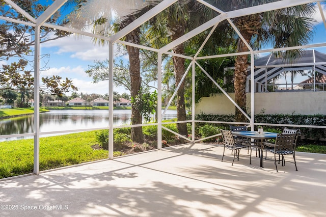 unfurnished sunroom featuring a water view and plenty of natural light