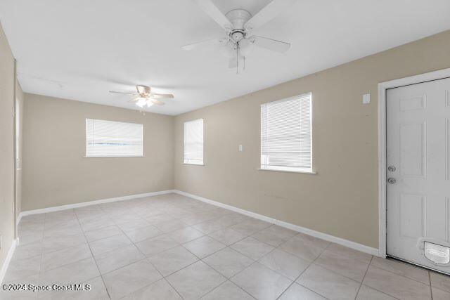 spare room featuring ceiling fan