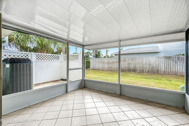 unfurnished sunroom with a wealth of natural light