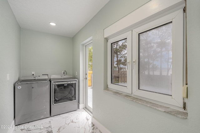 laundry room featuring washer and dryer