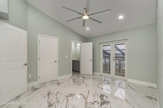 unfurnished bedroom featuring access to exterior, ceiling fan, french doors, and vaulted ceiling