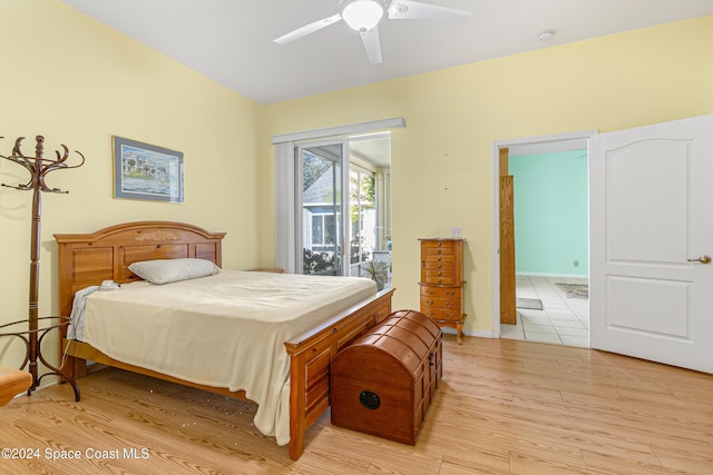 bedroom with access to exterior, ceiling fan, and light hardwood / wood-style floors