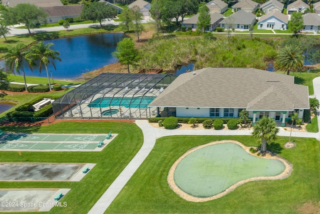 birds eye view of property featuring a water view