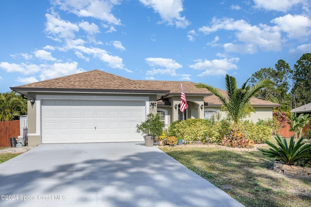 ranch-style house featuring a garage