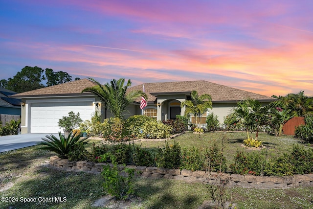 single story home featuring a garage