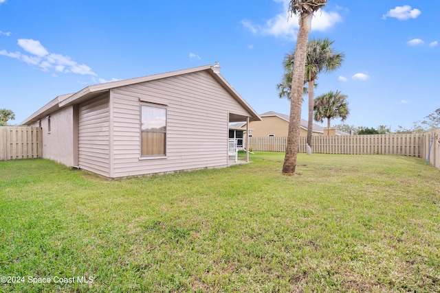 exterior space with a lawn