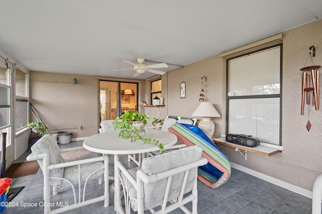 view of patio / terrace featuring ceiling fan