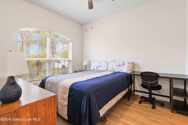 bedroom featuring ceiling fan and light hardwood / wood-style floors