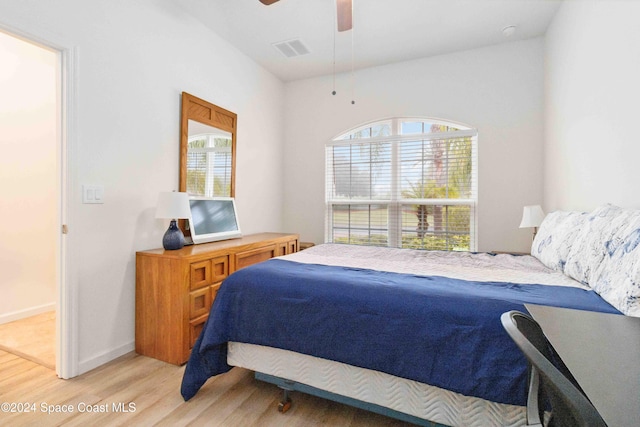 bedroom featuring ceiling fan and light hardwood / wood-style floors