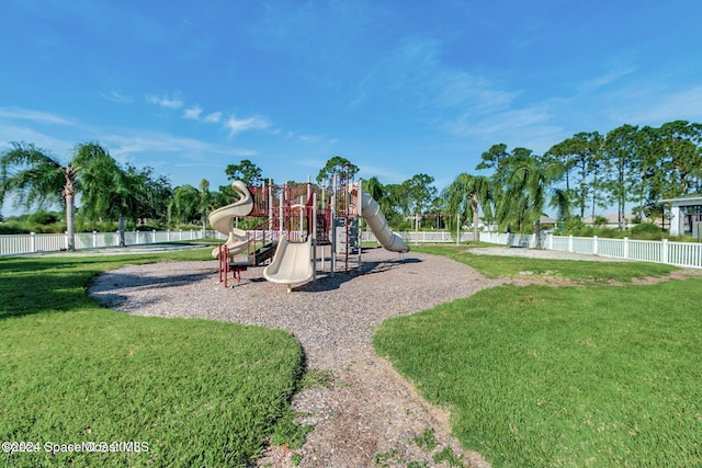 view of jungle gym featuring a yard