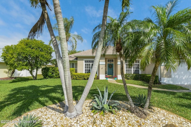 view of front of property with a front lawn