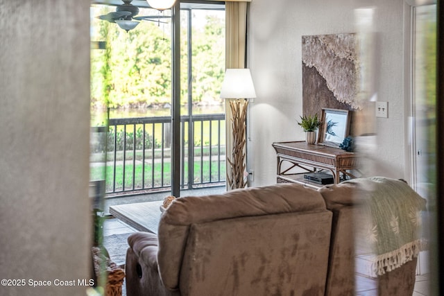 living room with a wall of windows