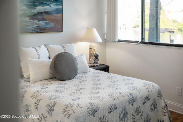 bedroom featuring hardwood / wood-style floors