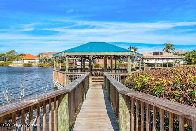 view of dock with a water view