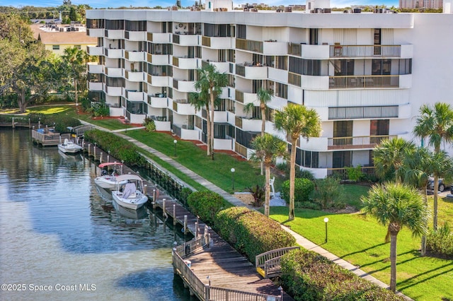 view of home's community with a water view