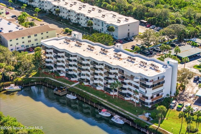 bird's eye view with a water view