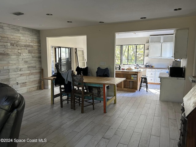 dining area featuring light wood-type flooring