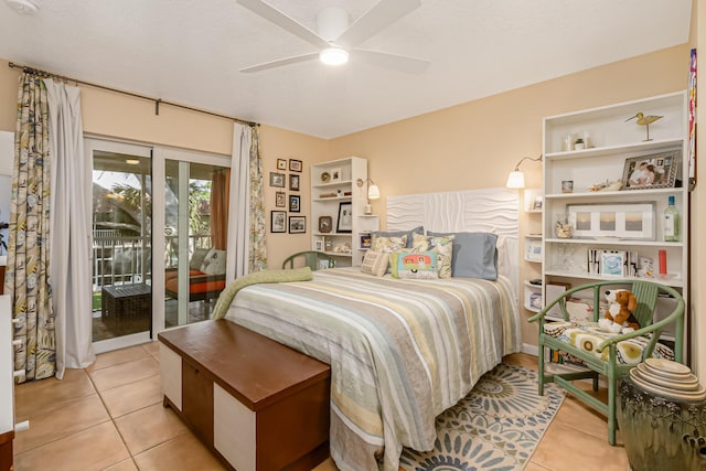 tiled bedroom with access to outside and ceiling fan