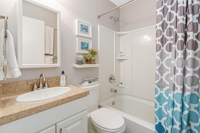 full bathroom featuring vanity, shower / bath combo, and toilet