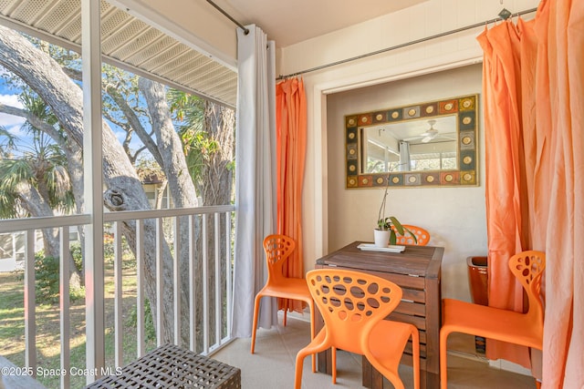 dining area featuring ceiling fan and plenty of natural light