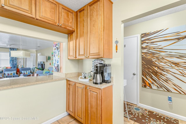 kitchen featuring light tile patterned floors