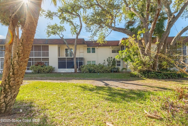 exterior space with a yard