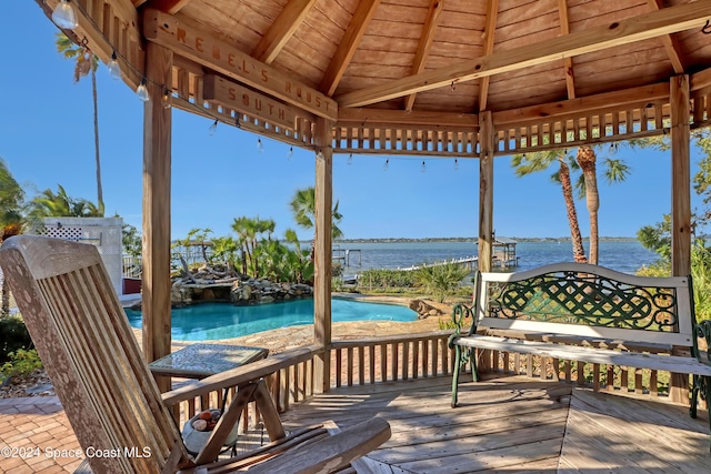 deck featuring a gazebo and a water view