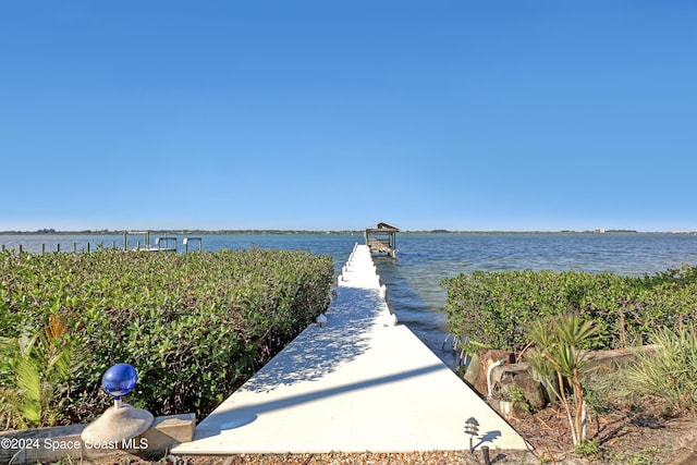 view of dock with a water view