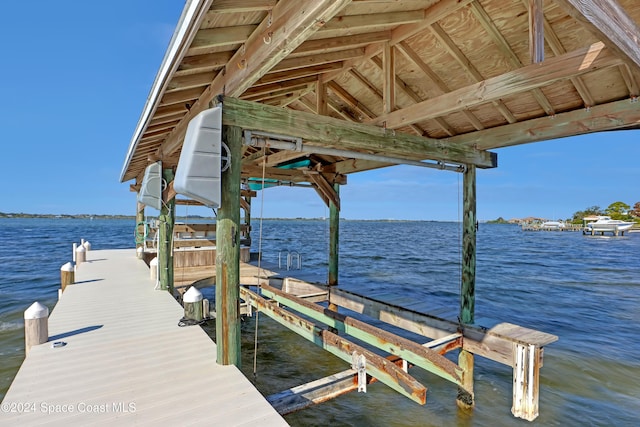 view of dock with a water view