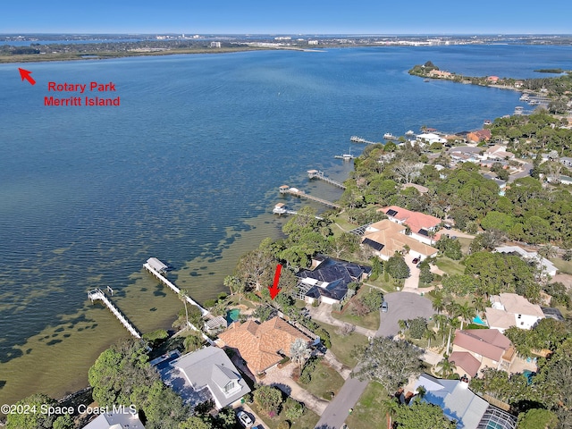 drone / aerial view with a water view